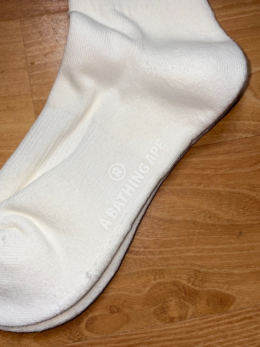 A Bathing Ape Cream Crew Socks with Subtle Branding